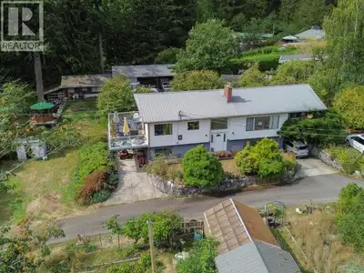 SHOP & SUITE! Beautifully updated 4 bed, 3 bath home on .65 acres with orchard trees, gardens, huge...
