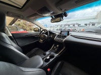 The NX 200t is characterized by its aggressive "spindle" grille and sharp, angular body lines. As th... (image 8)
