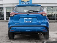 Command attention in this former daily rental vibrant Electric Blue Metallic 2024 Nissan Kicks SV, e... (image 3)