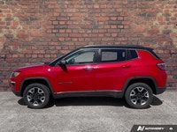KBB.com 10 Best All-Wheel-Drive Vehicles Under $25,000. This Jeep Compass has a trusty Regular Unlea... (image 1)
