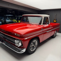 Check out this beautifully restored 1965 Chevrolet C10 Deluxe pickup finished in Cardinal red and Er... (image 1)