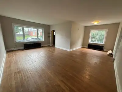 Available July 1, 2026 Bright, exceptionally spacious 3-bedroom main level apartment located on McAl...