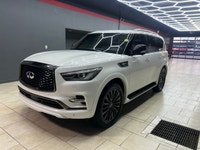 Experience luxury and power with the stunning 2024 INFINITI QX80 LUXE, presented in a sophisticated... (image 6)
