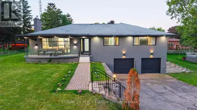 This is the one you've been waiting for! Situated on a rare 1/3-acre lot just seconds from the city,...