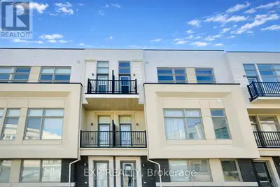 Bedroom for rent with shared bathroom in a modern freehold townhouse in Cachet. Bright bedroom with...