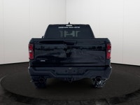 This 2026 RAM 1500 REBEL CREW CAB 4X4 has the following options Lux Leather Trimmed Bucket Seats, Re... (image 4)