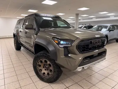 Set your sights on the next route, because this 2024 Toyota Tacoma Hybrid is built for drivers who w...