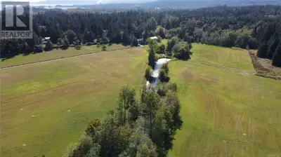 Welcome to an extraordinary private gated 56.87-acre property in the heart of Vancouver Island, wher...