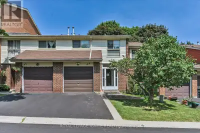 Welcome to this stunning townhome, tucked away in a quiet, family-friendly neighbourhood. As you ste...