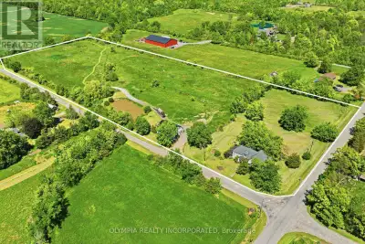 Discover the potential of this 10-acre corner-lot hobby farm, offering a rare opportunity for renova...