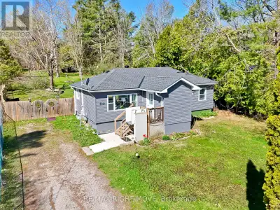 Situated on a generous 0.49-acre lot (approximately 60' x 330'), this raised bungalow offers a perfe...