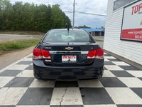 A practical compact sedan with a comfortable interior, efficient performance, and modern convenience... (image 4)