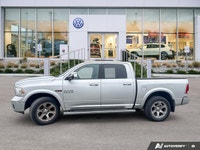 Command your day with this robust 2017 Ram 1500 Laramie Crew Cab Pickup. Powering through tasks or c... (image 1)
