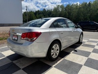 A practical compact sedan with a comfortable interior, modern convenience features, and efficient pe... (image 3)