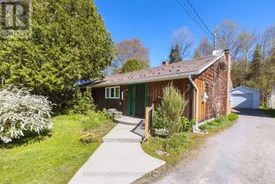 Lovingly lived in and meticulously maintained by the same family for decades, this cherished bungalo...