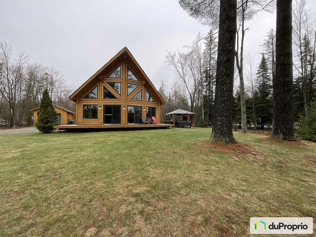 $545,000 - Price Taxes Not Included - Cottage in Stukely-Sud — photo 1