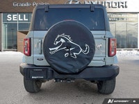 Embrace the spirit of adventure with the 2022 Ford Bronco. This stunning Shadow Black convertible is... (image 4)