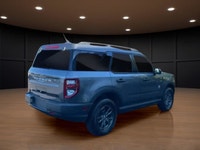 The 2023 Ford Bronco Sport Big Bend in a striking gray finish is an adventure-ready SUV with a power... (image 4)
