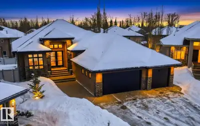 Absolutely stunning 1,900 sq ft fully finished bungalow with an oversized triple heated garage, quie...