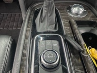 Experience luxury and power in the 2024 Nissan Armada 4x4 Platinum, presented in an eye-catching Bla... (image 8)