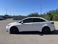 This used 2025 Toyota Corolla SE 2WD | Sunroof | Heated Steering Wheel is a smart hybrid sedan for d... (image 9)
