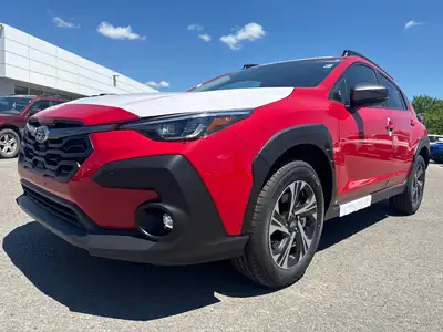 Experience the thrill of the 2026 Subaru Crosstrek Touring in a vibrant red, offering an automatic t...