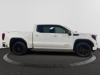 Welcome to Capital GMC! This 2026 GMC Sierra 1500 in Summit White is equipped with 4WD and Gas V8 5.... (image 5)