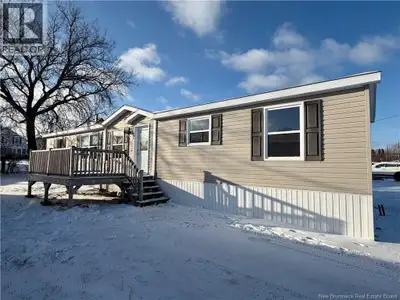 If youre looking for something move-in ready and easy to maintain, this 2018 mini home is it. Locate...