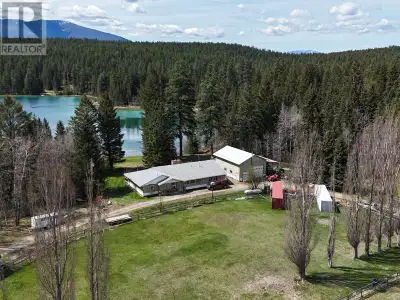 The Rocky Mountains tower in front of you and Norbury Lake gently lapping the shore behind you. In t...