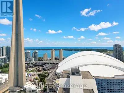 High-Floor South-West Corner Suite With Unobstructed Lake & CN Tower Views! Perched on the 34th floo...