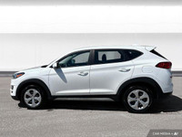 The 2020 Hyundai Tucson in Crystal White features all-wheel drive with advanced safety like lane dep... (image 2)