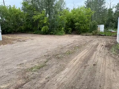 Available for RENT is an approximate 1/4 Acre gravelled yard with 26' storage container. It is conve...
