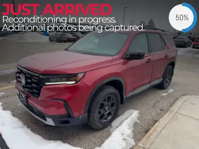 The 2024 Honda Pilot TrailSport AWD in a striking exterior color offers an adventurous drive with it...