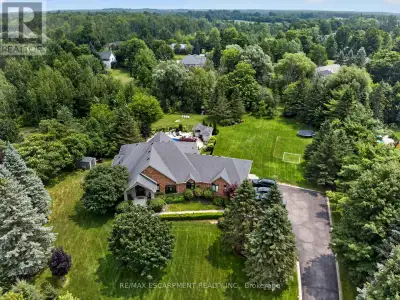 The one you've been waiting for! Welcome to 2050 15 Side Road, a truly exceptional executive bungalo...
