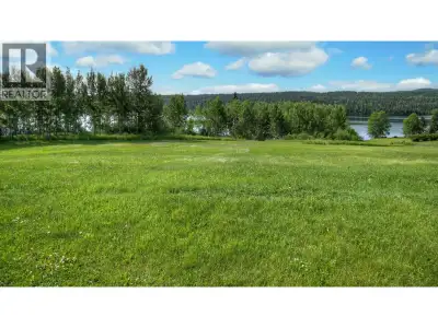 2.67 acres on Big Lake with 311 ft waterfront! This South-facing, landscaped lakefront acreage is su...