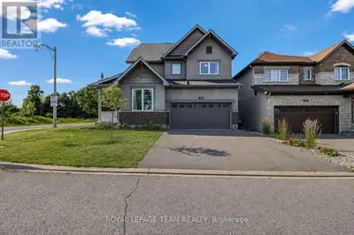 PRIME LOCATION! Nestled on a premium oversized corner lot in the heart of Barrhaven, this elegant do...