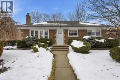 Welcome home to 37 Hillier Cres., Brantford. A stately brick bungalow is nestled in the highly sough...