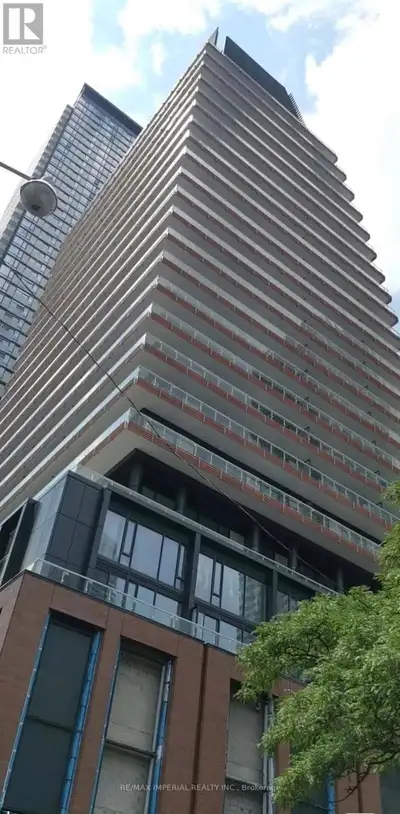 The Teahouse Condo with a 3-bedroom Suite and L-shaped balcony. Features Designer Kitchen Cabinetry...