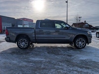 The 2026 Ram 1500 Tungsten in Granite Crystal Metallic combines refined style with advanced capabili... (image 7)