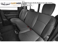 The 2026 Ram 3500 Tradesman Trim 4x4 Crew Cab 8 Box is a commanding presence with its bold Black ext... (image 9)