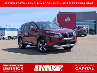 This pre-owned 2023 Nissan Rogue Platinum is finished in a beautiful Red paint with a refined Graphi...