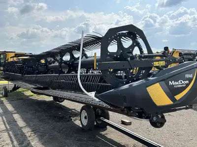 USED 2022 MACDON FD145 HEADER UNIT LOCATED AT OUR YORKTON LOCATION SLOW SPEED TRANSPORT STABILIZER W...