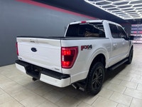 Experience the perfect blend of power and sophistication with the 2022 Ford F-150 XLT, presented in... (image 8)