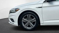 This 2021 Volkswagen Jetta Highline R-Line is a sleek sedan with a sunroof, back camera, and alloy w... (image 7)