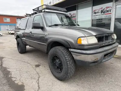 2008 MAZDA B4000 2008 Mazda B4000 SE 4x4 AUTOMATIQUE AIR CLIMATISER RACK SUR LE TOIT LIFTER TRES BEA...