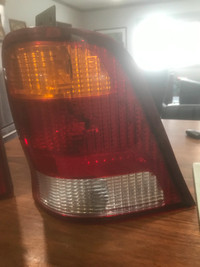 DRIVER TAIL LIGHT OFF 1999 FORD WINDSTAR