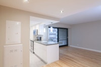 Semi-renovated Akelius two bedroom apartment for rent. Located near Drummond & Sherbrooke W in the D... (image 4)