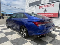 A stylish compact sedan with a modern interior, advanced technology, and efficient performance, offe... (image 5)