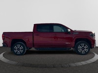 Welcome to Capital GMC! This 2026 GMC Sierra 1500 in Volcanic Red Tintcoat is equipped with 4WD and... (image 5)