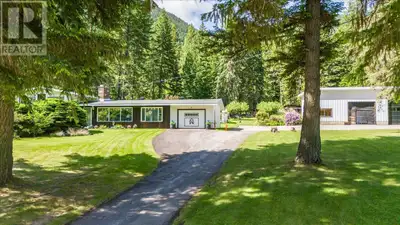 This meticulously maintained, single-owner 4 story, split-level home sits on 6.28 acres, just feet f...